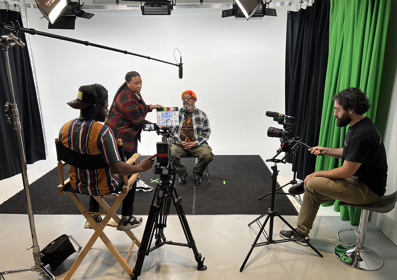 Students working in a videography apprenticeship