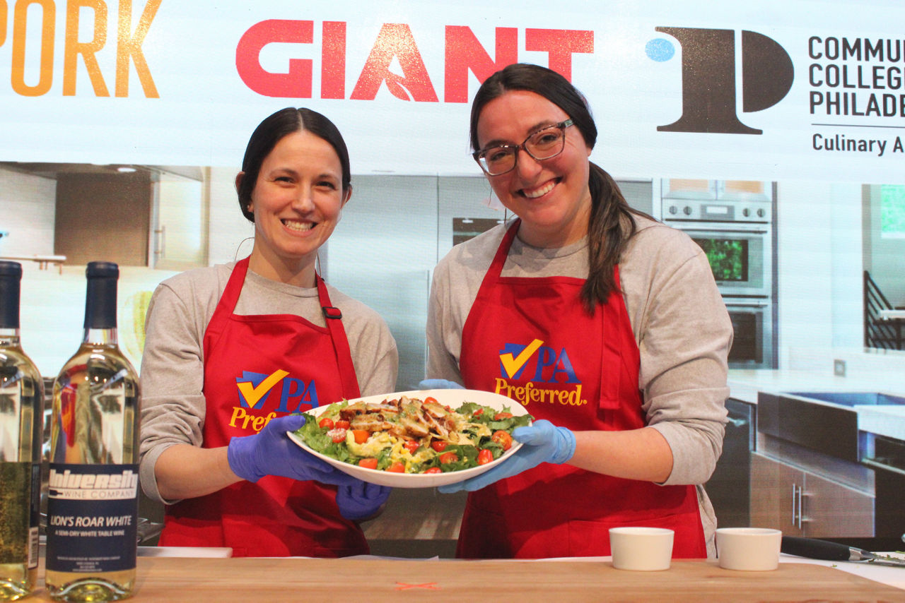 chefs presenting a salad