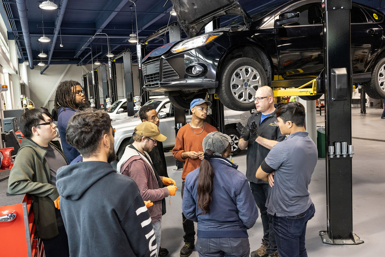 View of students in the Community College of Philadelphia's Career Advanced Technology Center  automotive classroom