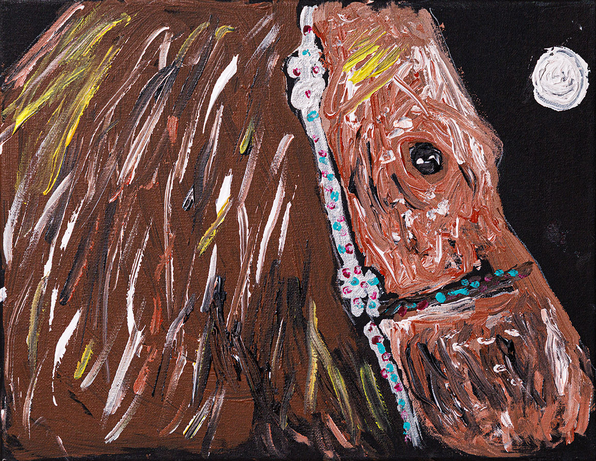 brown horse wearing a bridal