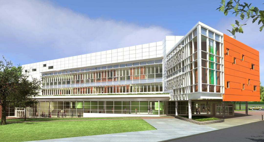 Exterior view of Delaware County Community College’s modern academic building, featuring a mix of glass, white paneling, and a bold orange accent wall..