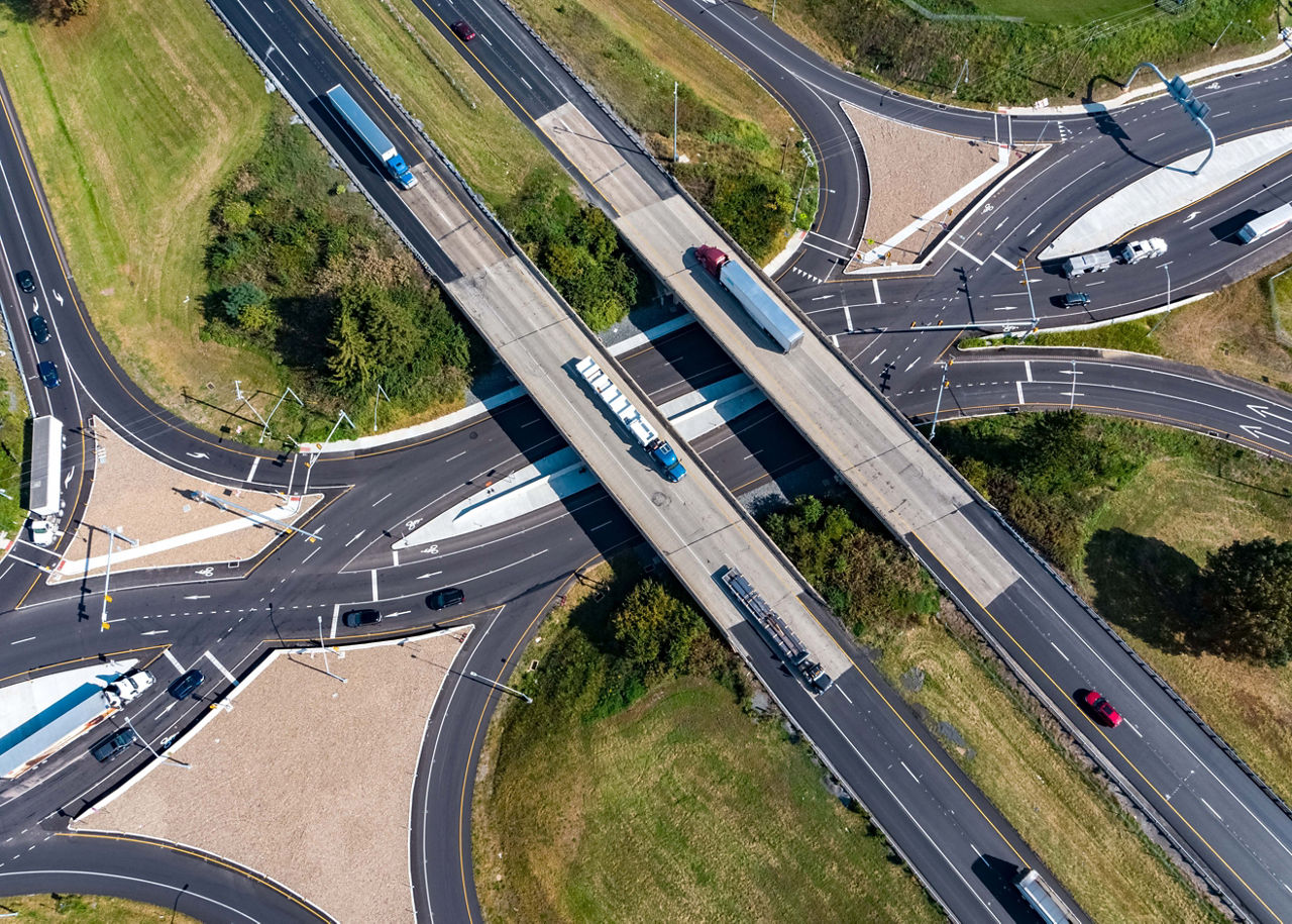 Cars driving through a Diverging Diamond Interchange