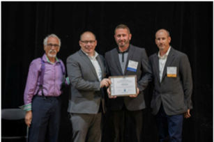 Dep. Secs. Kirk and Snyder receive an award from Preservation Pennsylvania