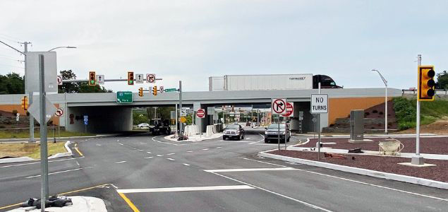 Cars driving through a Diverging Diamond Interchange