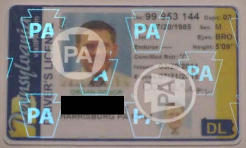 image of a driver's license showing the holographic effects of the new security features