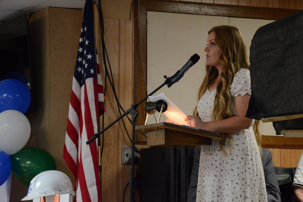 Emily Hagy speaks at the memorial ceremony. 