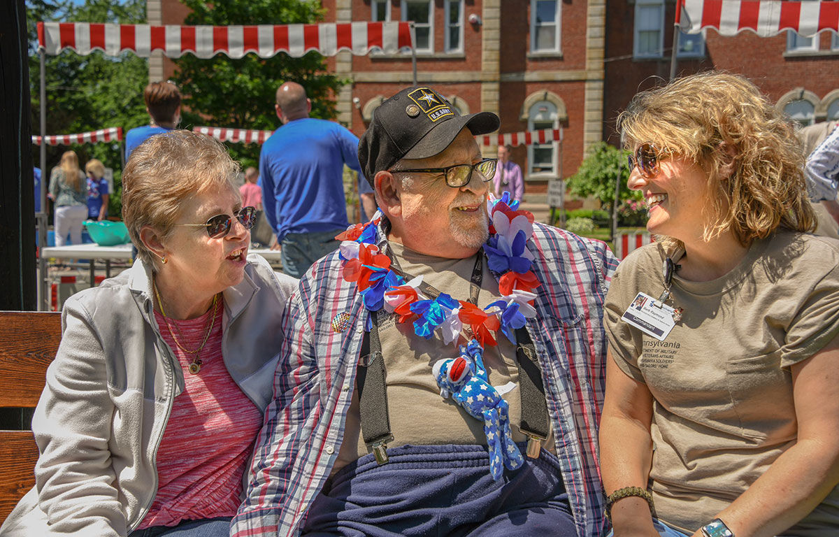 Image of Veterans Home employee with residents