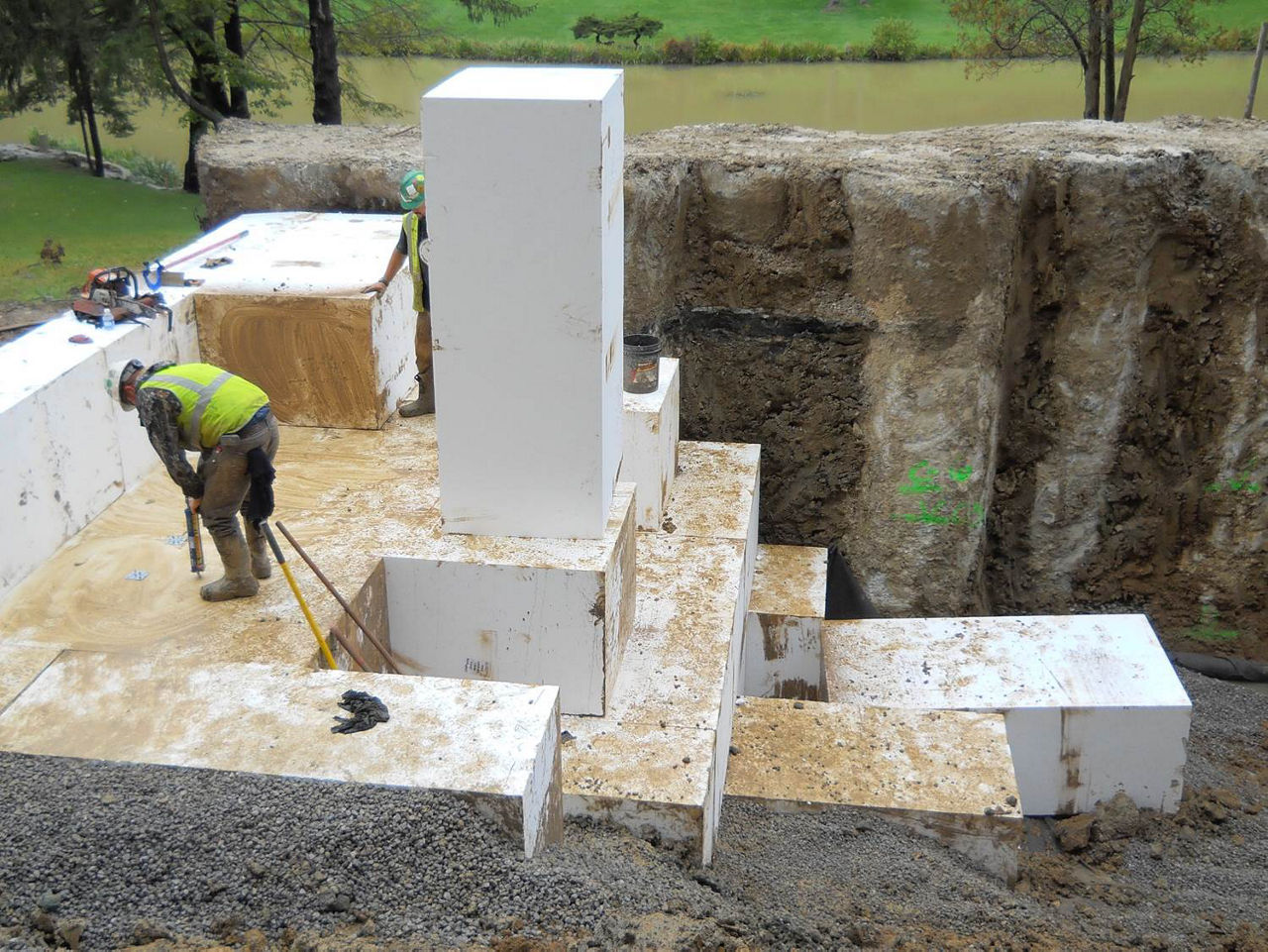 Construction Crew placing geofoam blocks 