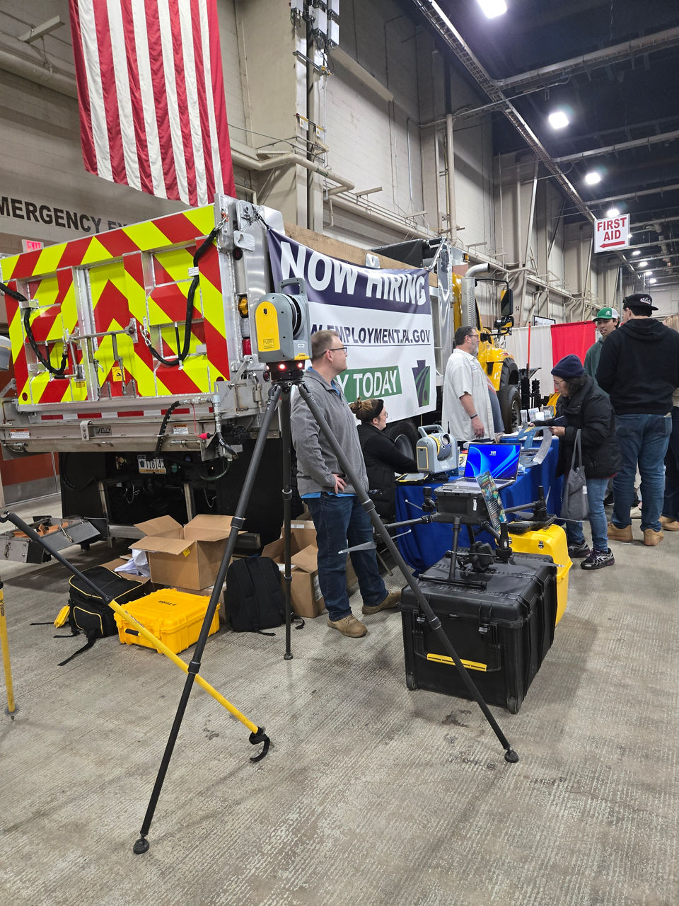 Image of various PennDOT equipment, including a drone and a scanner in front of a PennDOT truck.