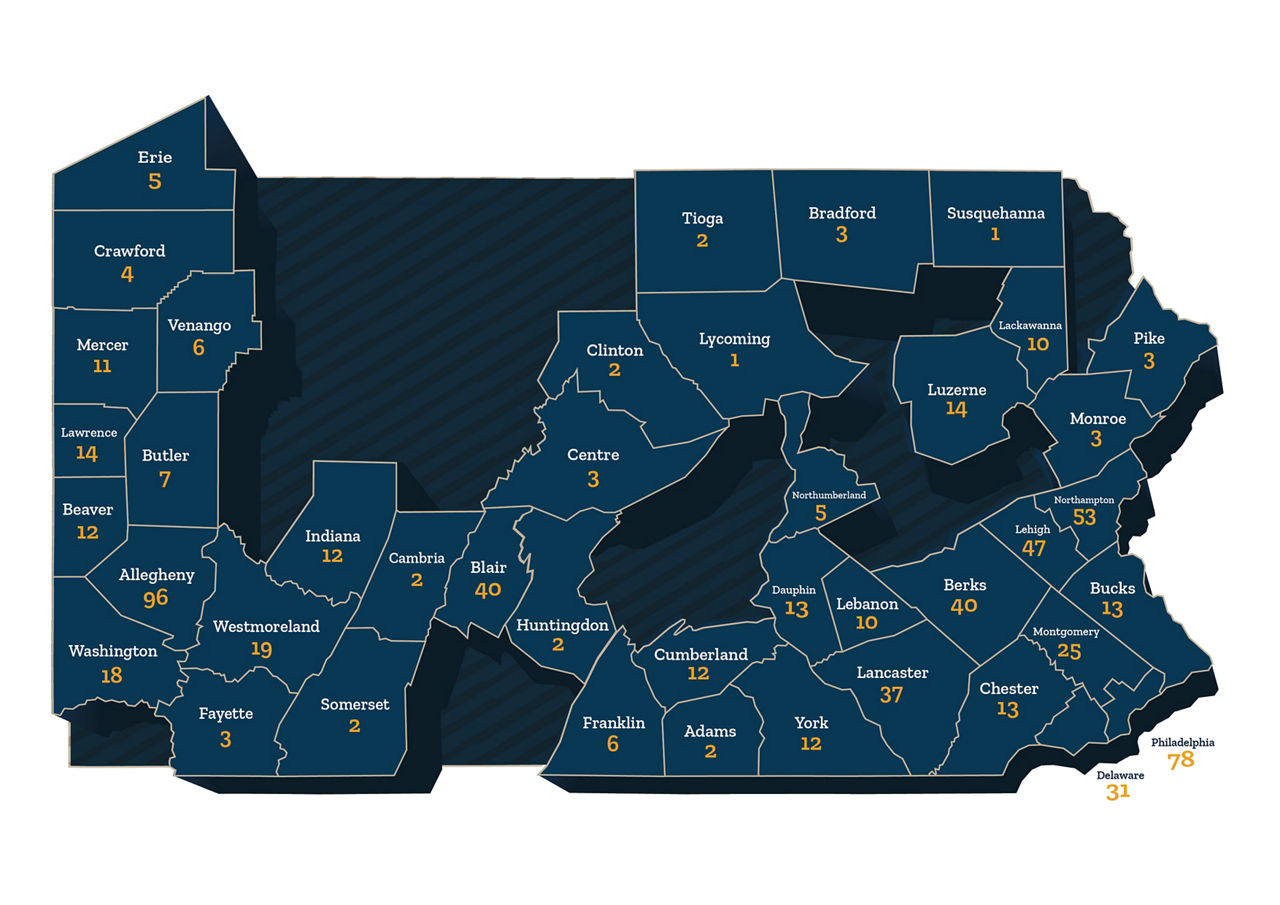 Blue PA county map showing county names and number of officers supported through PCCD grant funding under the Shapiro-Davis Administration.