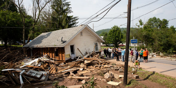 PEMA and the governor tour damages after flooding in Pennsylvania.