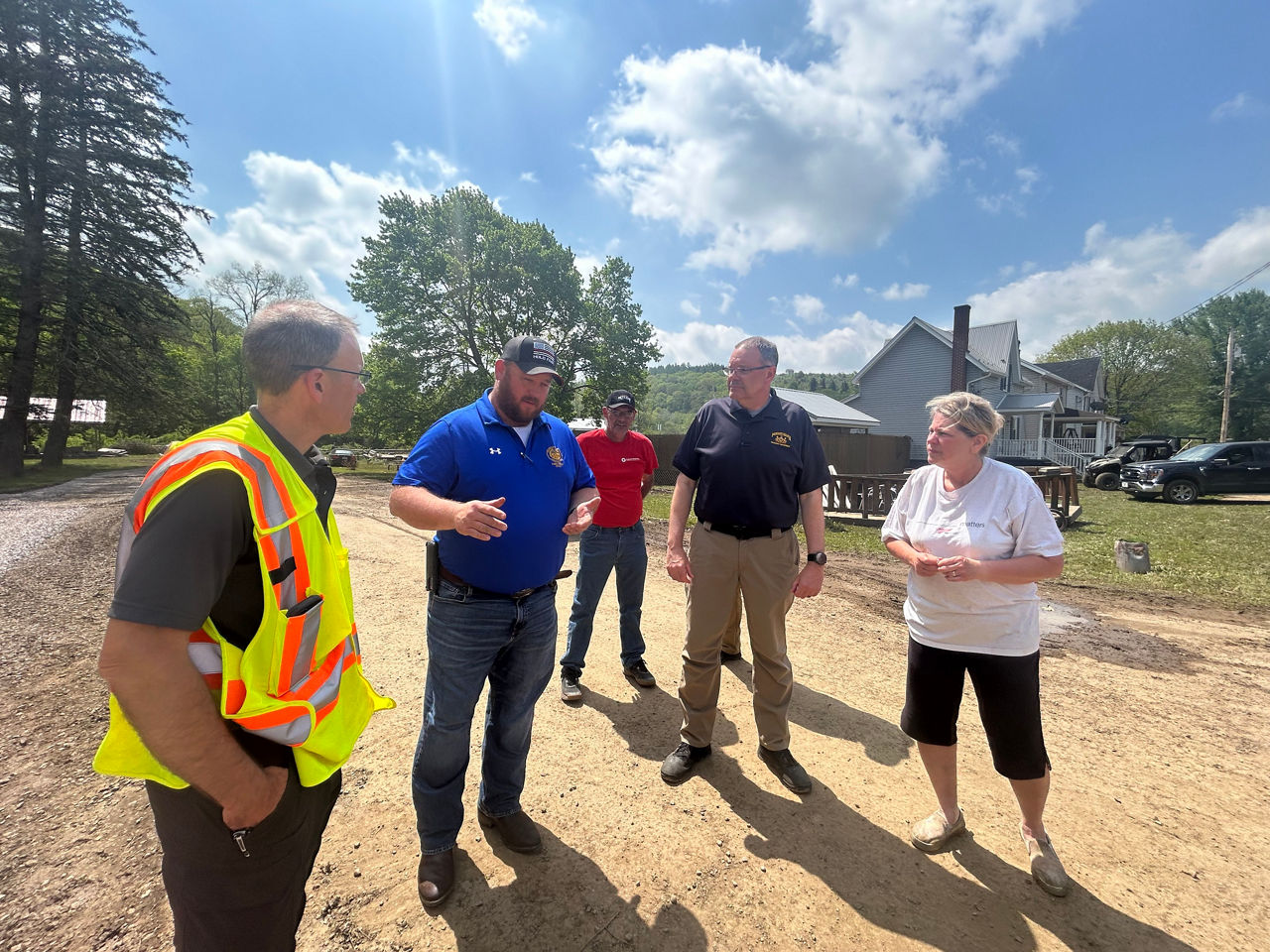 State officials speaking at site visit to flood damaged bridge on U.S. 219