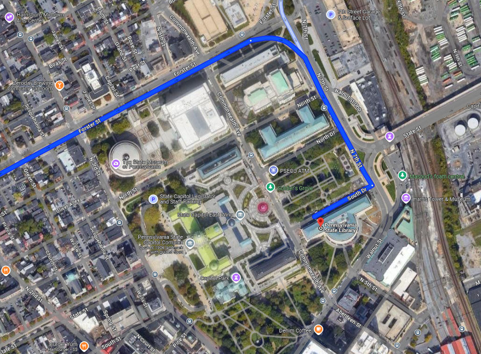 Aerial view map with a blue highlighted route leading to the Forum Building
