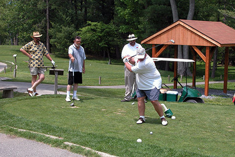 Four men golfing at Caledonia State Park