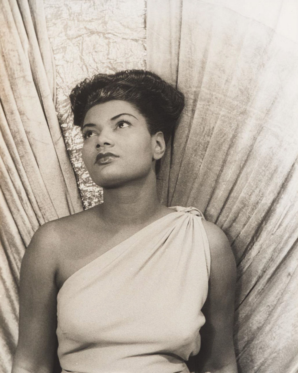 Vintage portrait of woman in draped dress