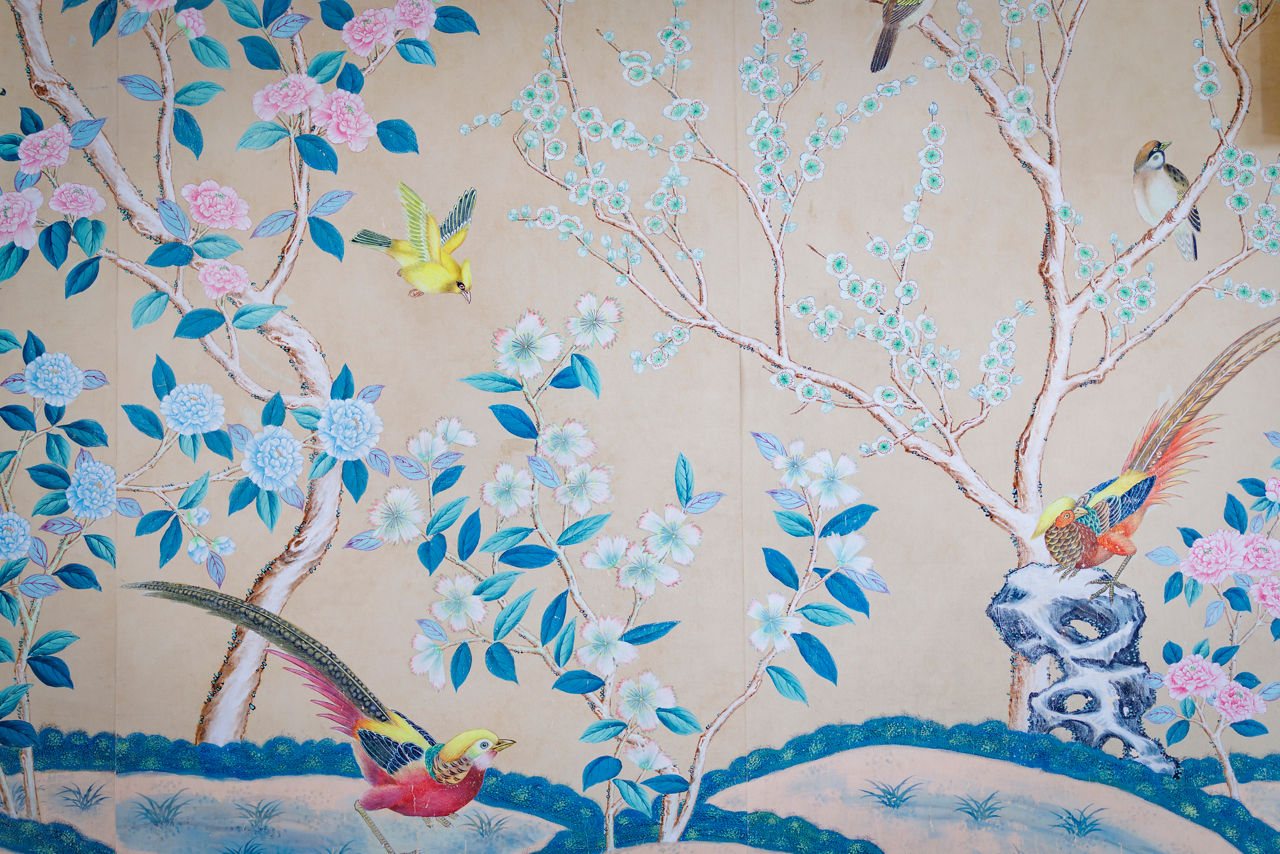 Colorful birds and blossoms on decorative mural