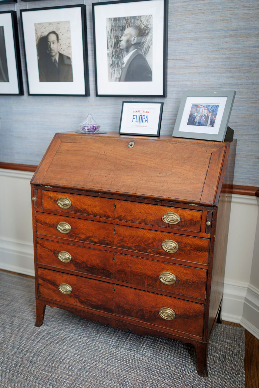 Antique wooden secretary desk in home office setting
