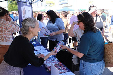 Secretary of Health Debra Bogen hands out gun lock to citizen in Clarion