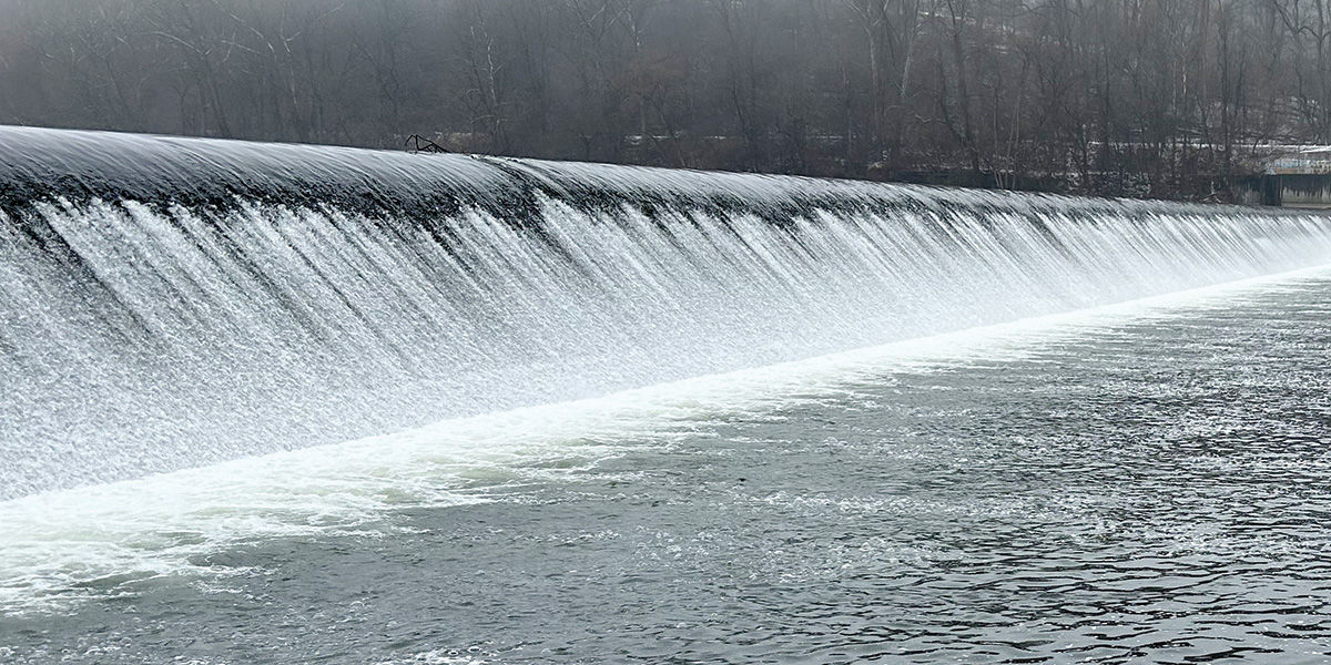 Close-up of a low head dam on a river.