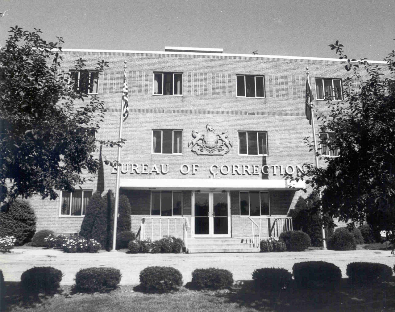 A black and white picture of the old Bureau of Corrections building