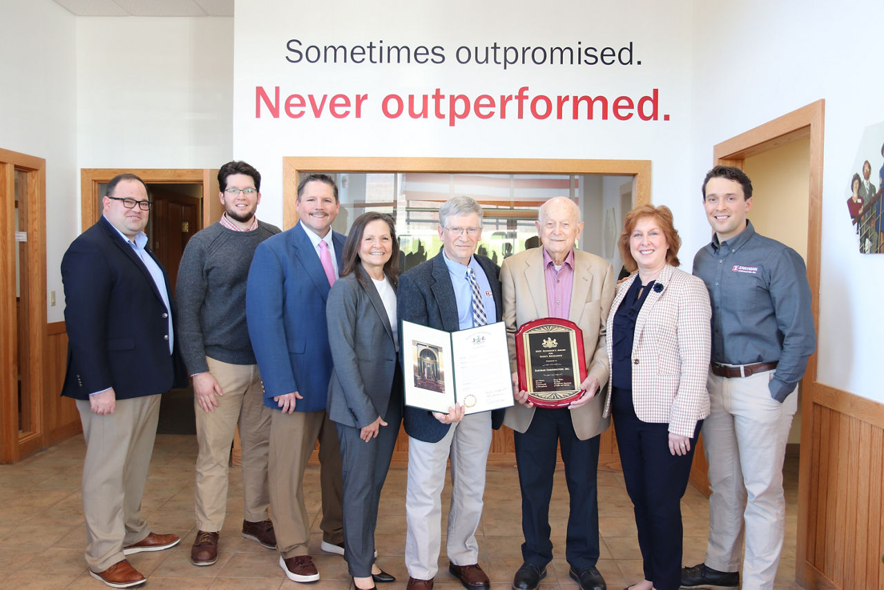 PA Department of Labor and Industry Secretary Nancy A. Walker stands with GASE award winner, Zartman Construction, Inc.