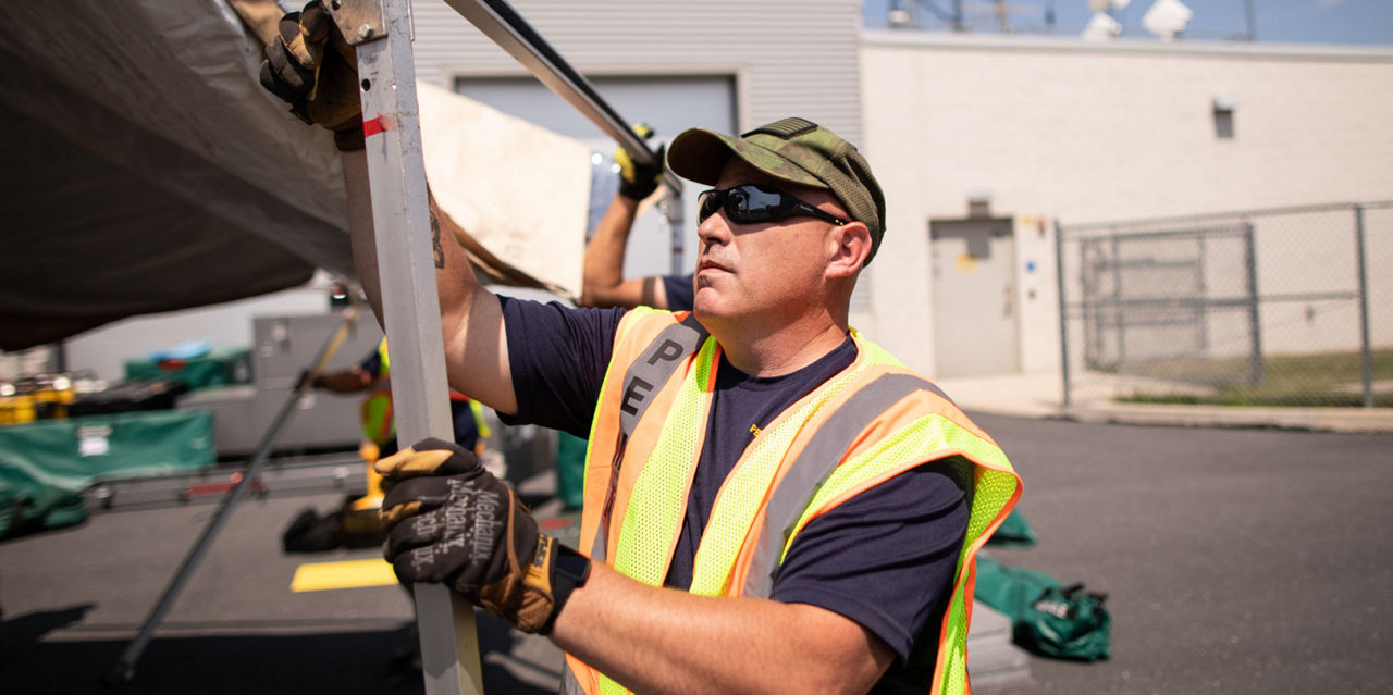 A professional participates in an integrated preparedness exercise.