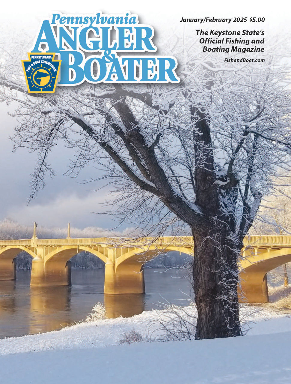 Cover page of the January/February Pennsylvania Angler & Boater Magazine picturing a winter landscape scene of a tree with a river and a bridge behind.