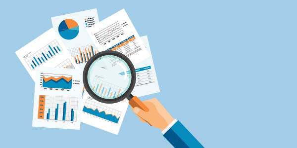 Graphic of person holding magnifying glass over documents of data, tables, and statistics.