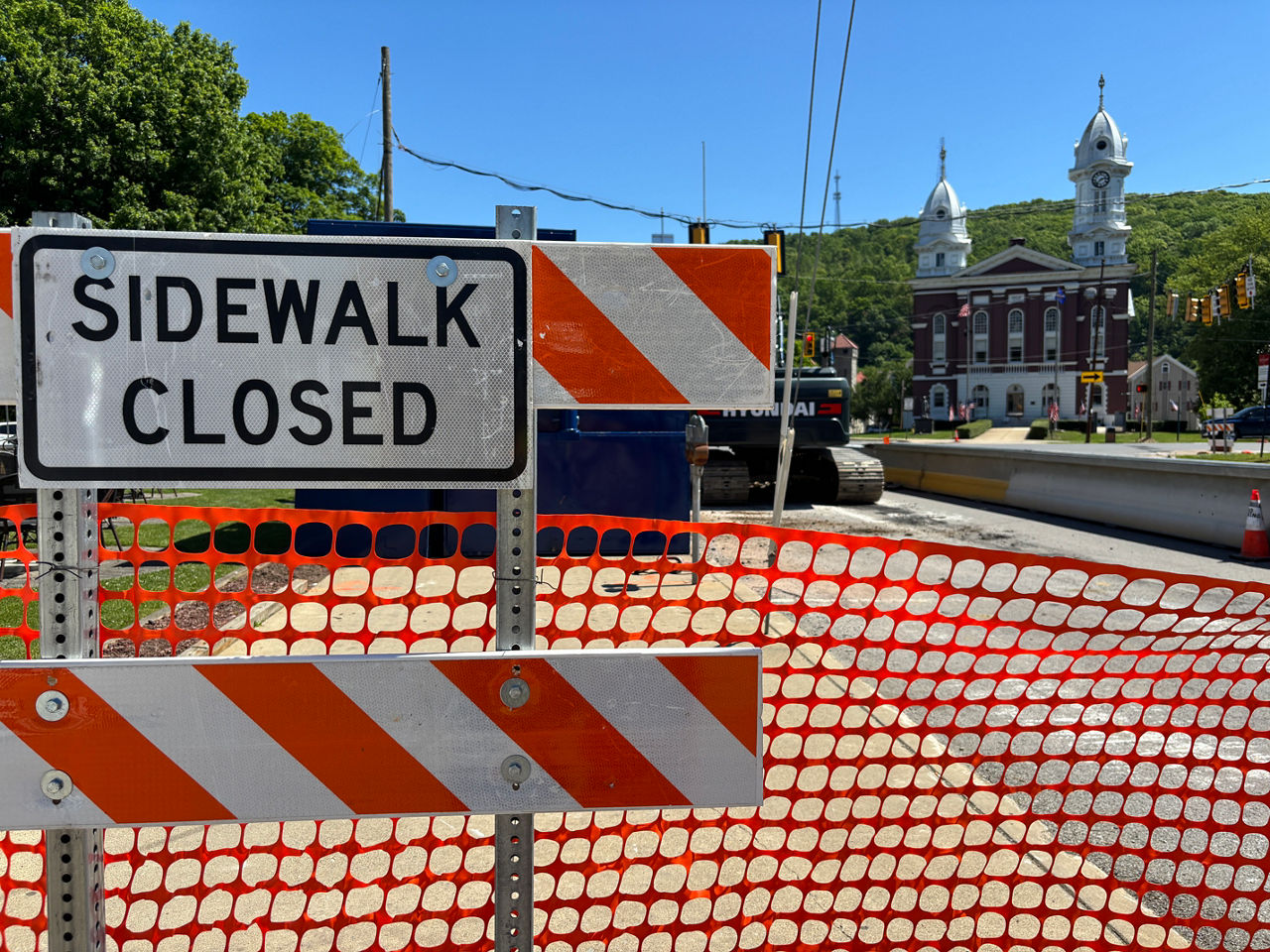Sidewalk closed sign in work zone