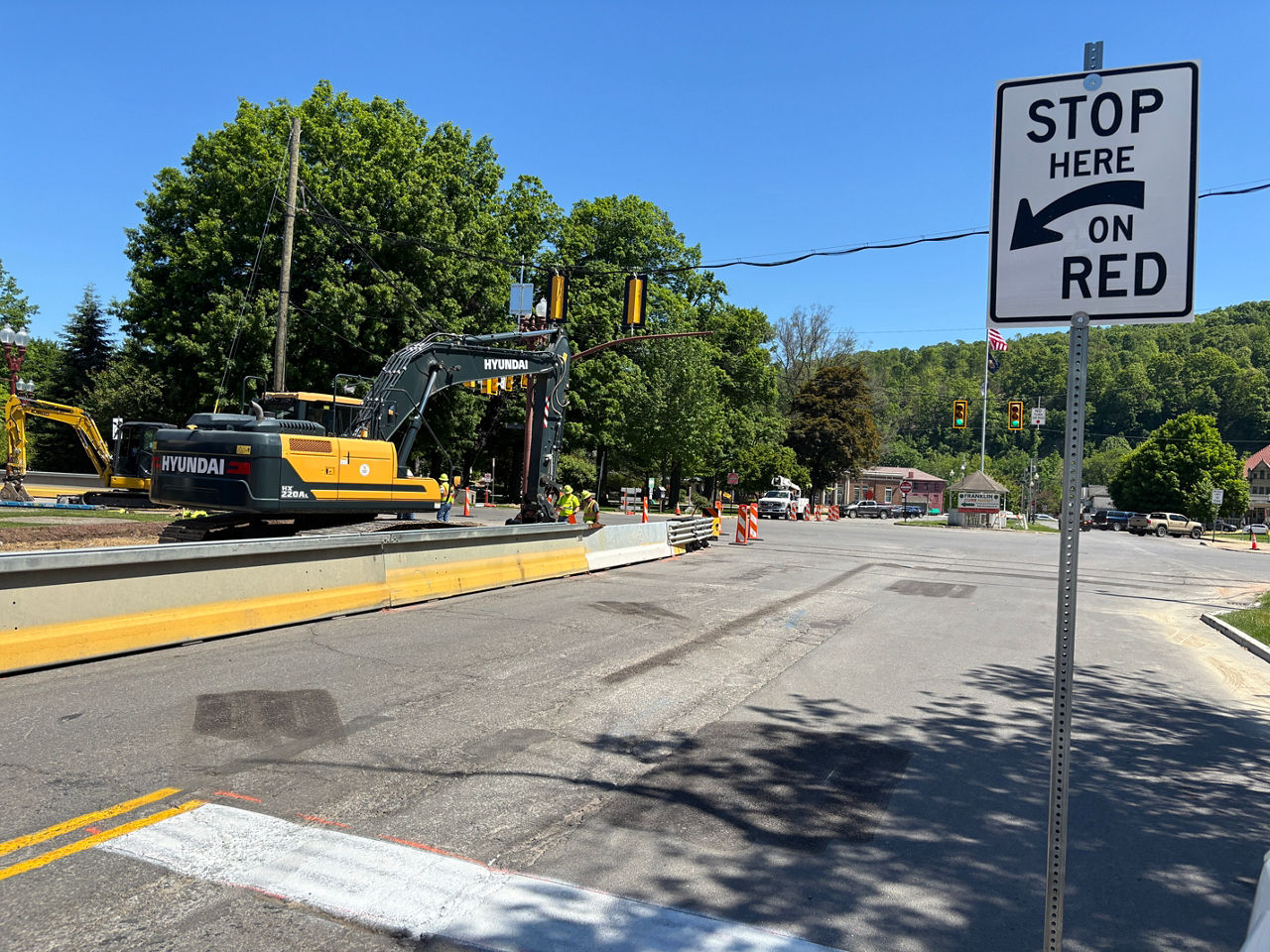 Stop here sign and stop bar