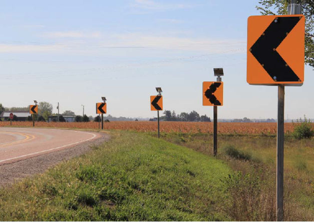 sequential dynamic curve warning system installed roadway