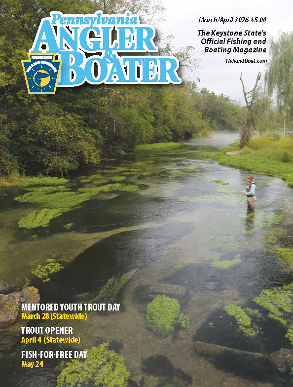 Cover of the March/April 2026 edition of Angler & Boater Magazine featuring a woman wearing waders and fishing in a stream surrounded by green plants and marsh lands.