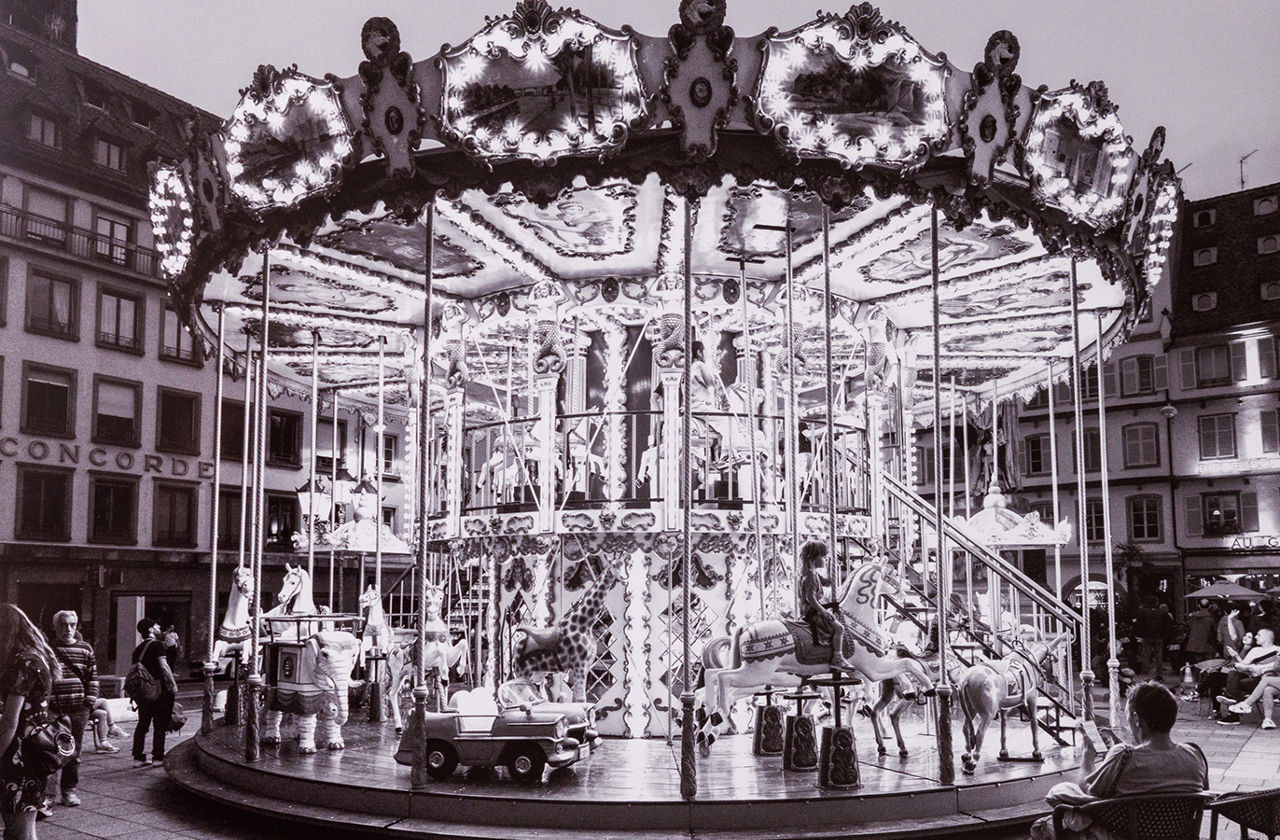 black and white photo of carousel