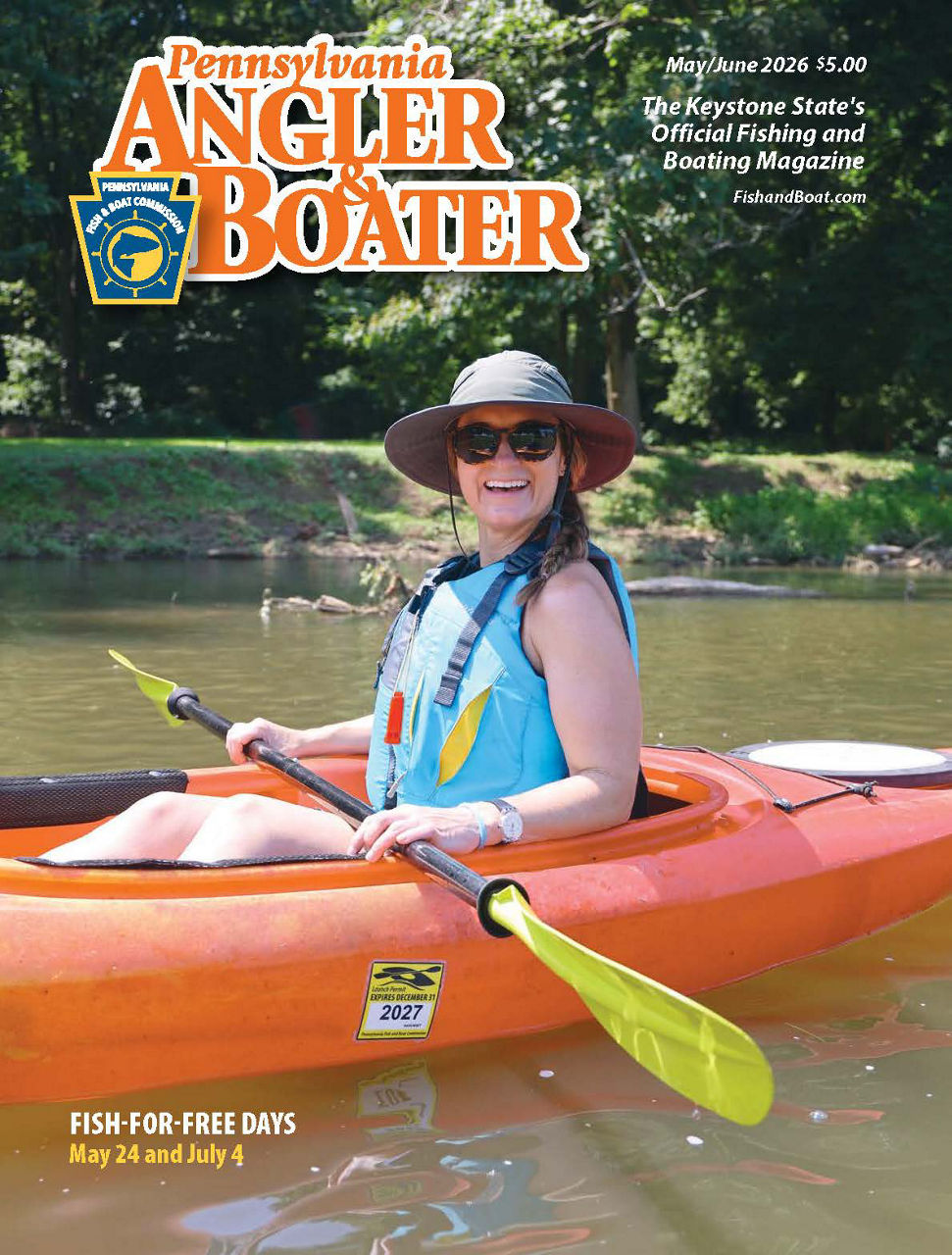 Cover of May/June 2026 edition of Pennsylvania Angler & Boater Magazine featuring a woman wearing a life jacket smiling while sitting in a kayak holding a paddle.