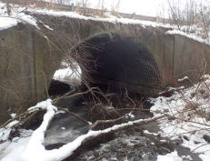 Large pipe under roadway