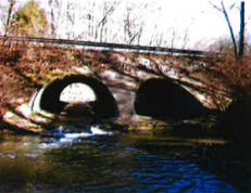 Large pipe under roadway