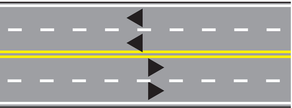 multi-lane highways with double solid yellow lines in the middle and broken white lines in each direction