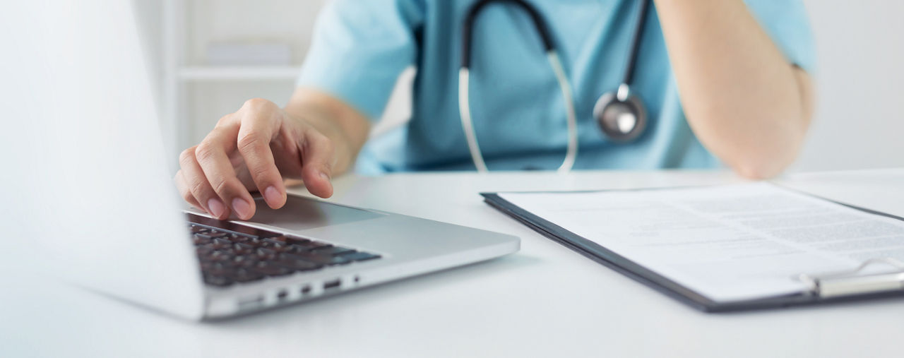 Doctor working on a computer