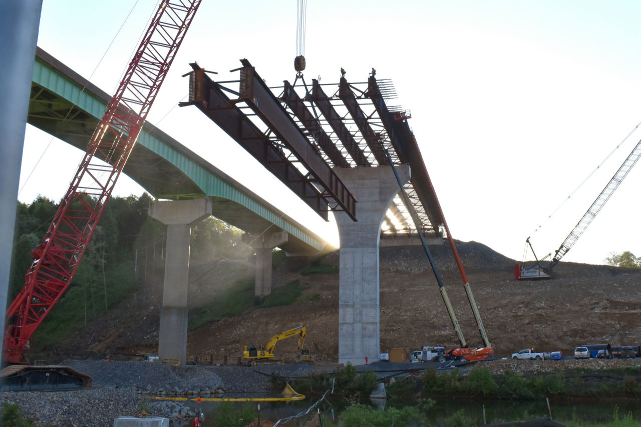 Setting girders on eastbound bridge over North Fork Creek 