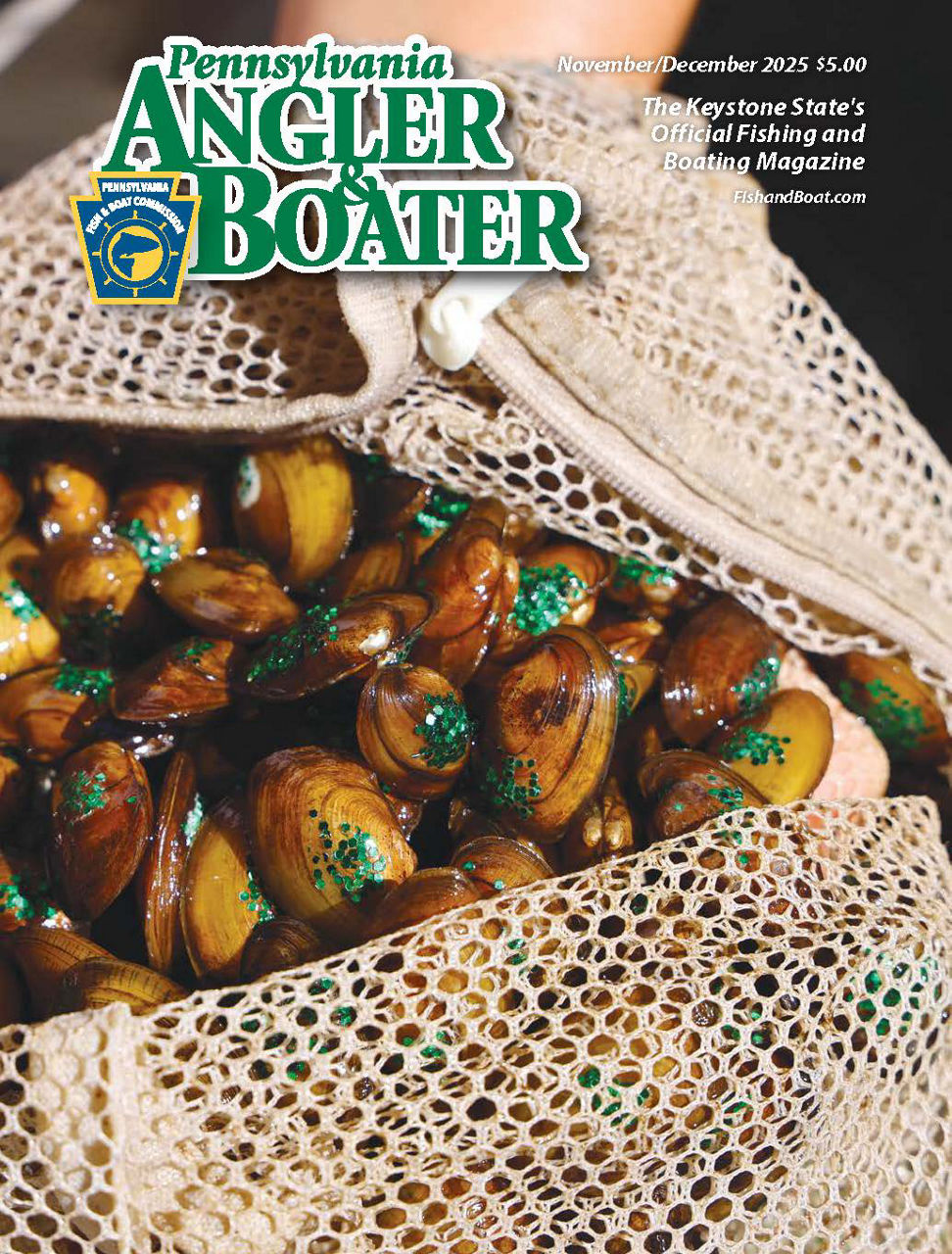 Cover page of the November/December edition of Angler & Boater Magazine featuring a close-up of a pile of juvenile mussels tagged with green glitter.