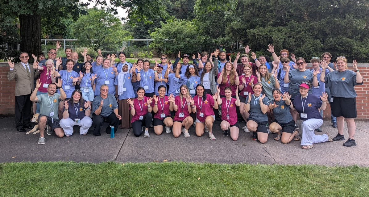 Photo of a group of students with visual or hearing impairments and L and I staff in State College, PA at summer camp
