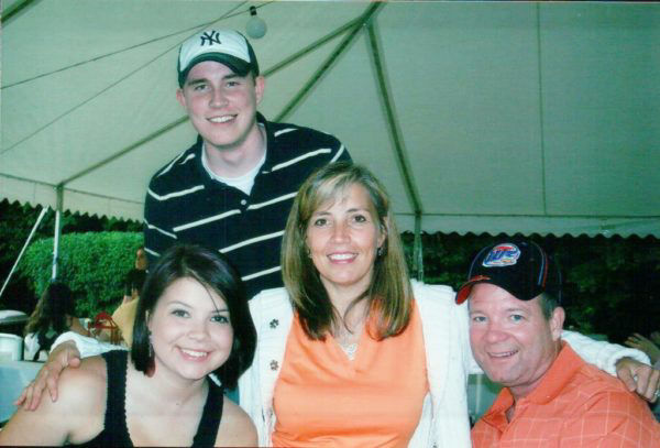 Photo of Paul Miller with his mother, father, and sister