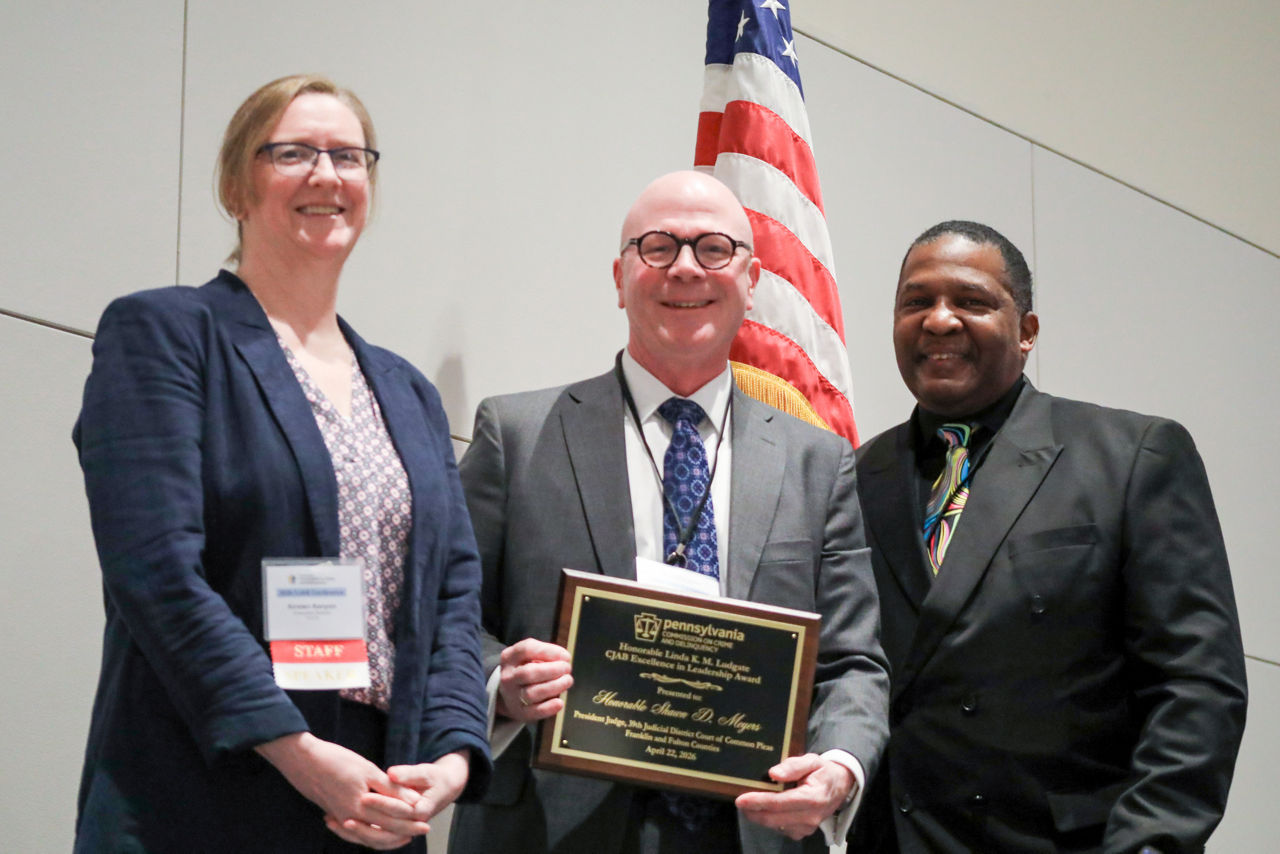 PCCD Executive Director Kirsten Kenyon, the Honorable President Judge Shawn Meyers, and PCCD Criminal Justice Advisory Committee Chair Jim Turner