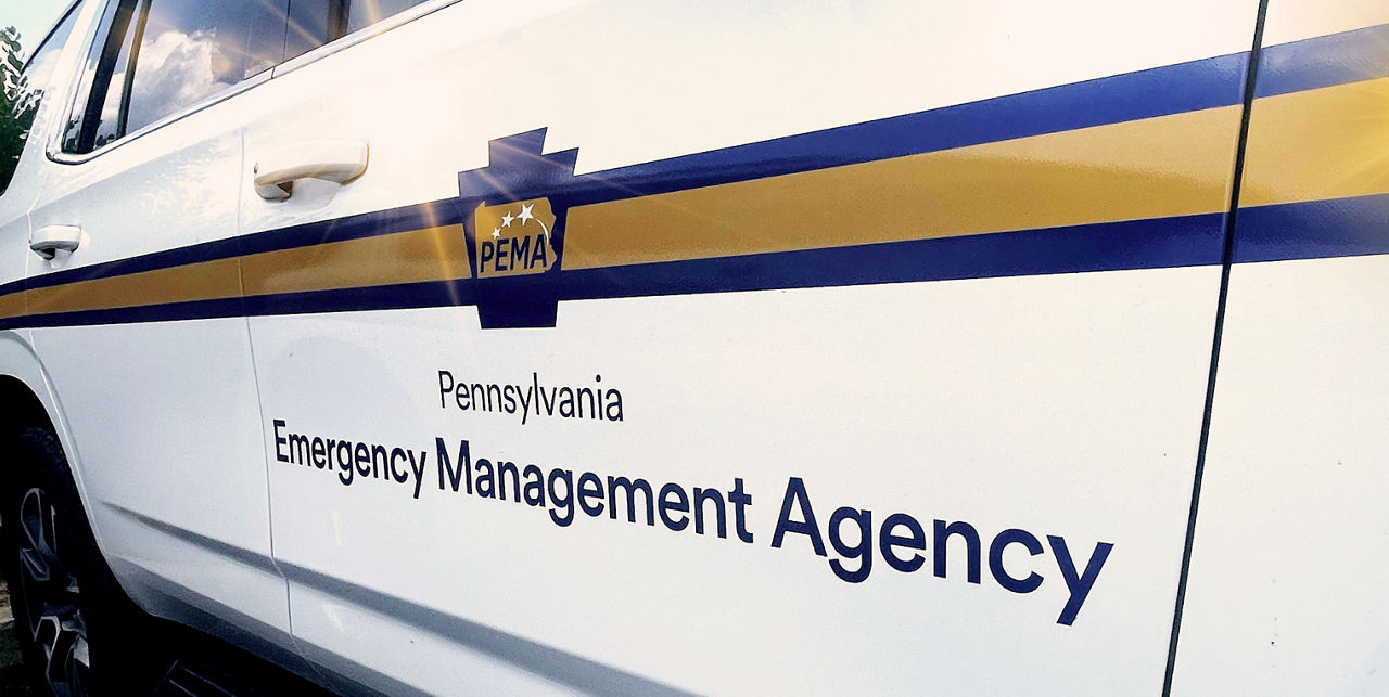 A PEMA truck has the keystone logo on its side.