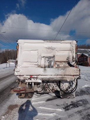 back of dirty PennDOT dump truck