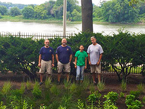 The team that helped create the rain gardens at the Residence.