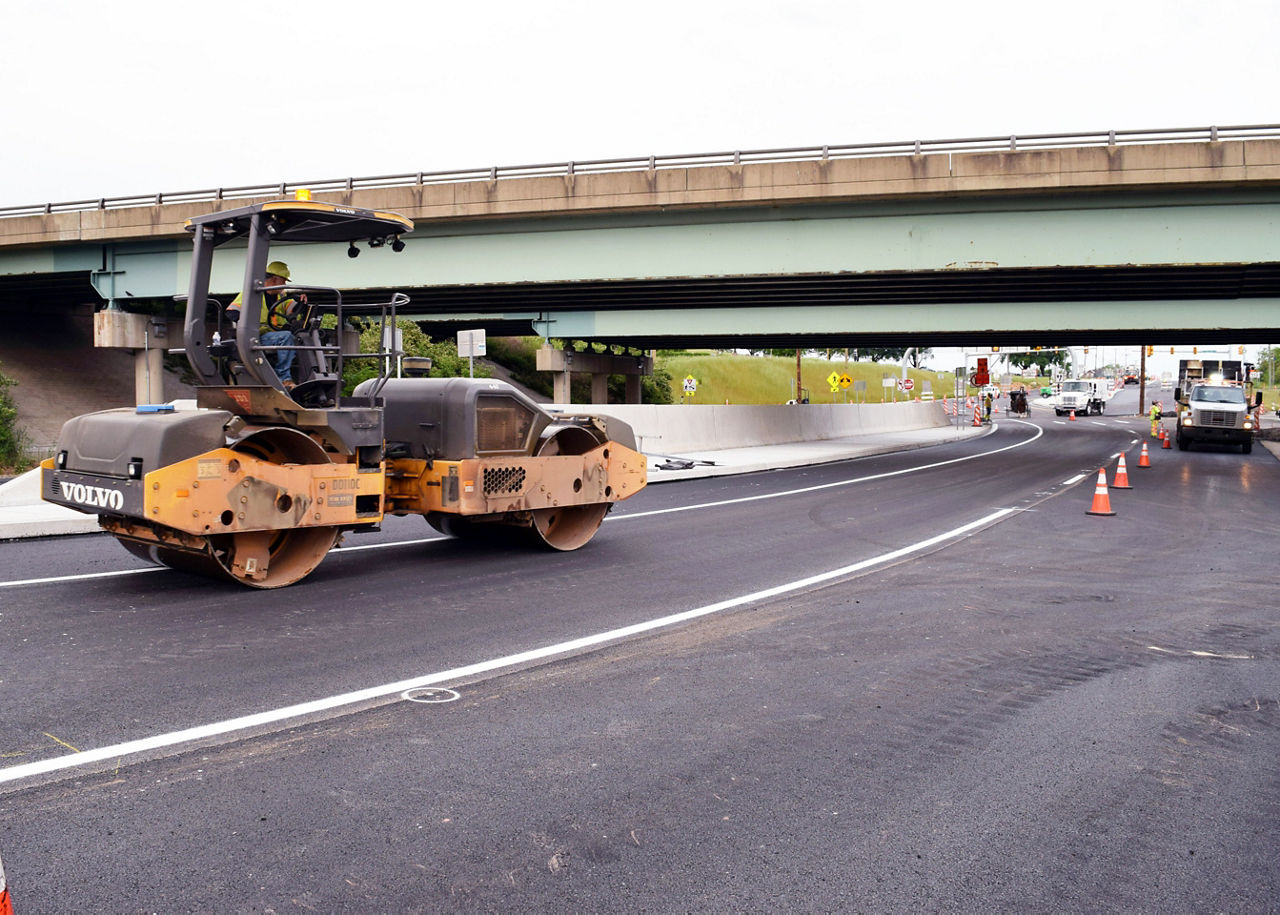 roller smoothing paved road