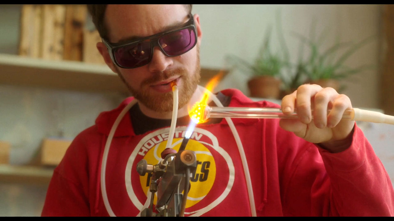 Person doing glass blowing