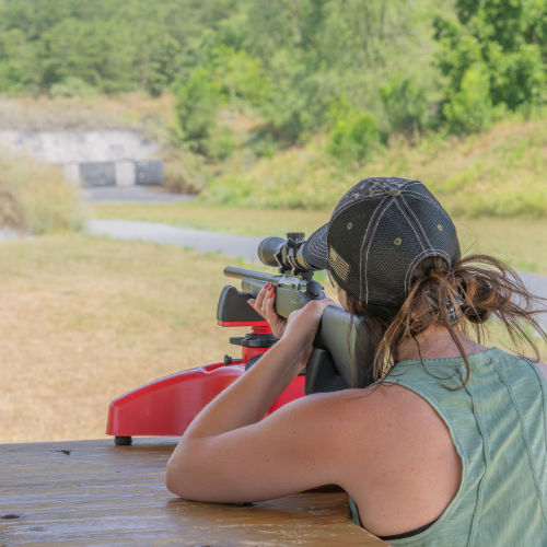 female shooter at range