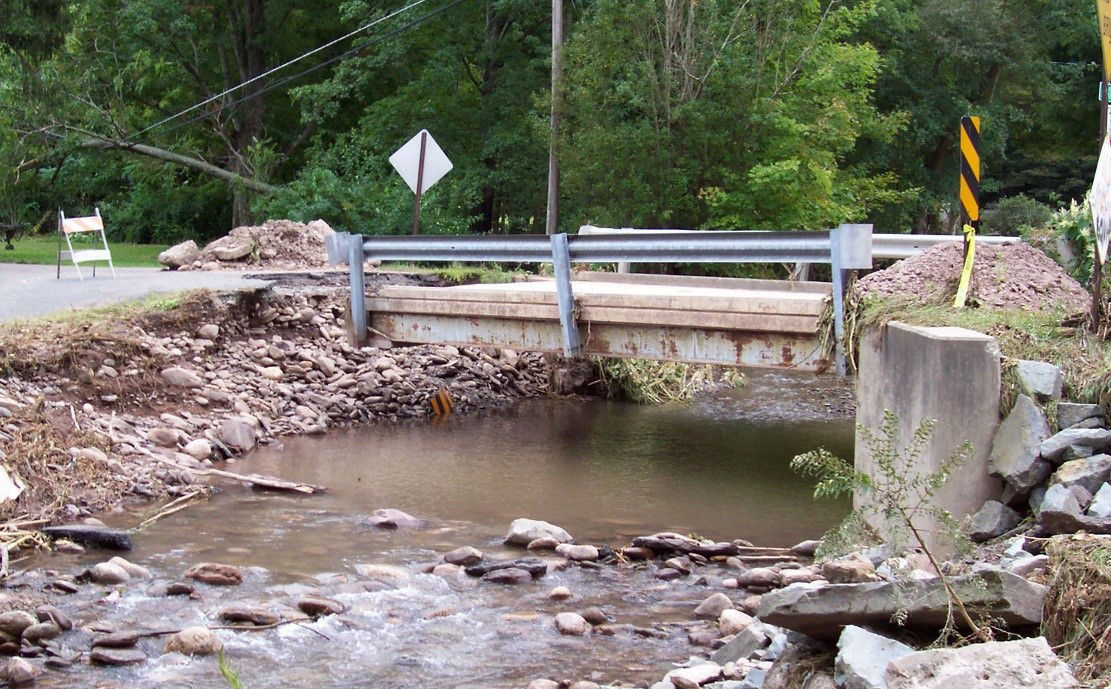 Storm_damage_to_bridge_washed_out_abutment